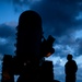 USCGC Munro Sailor Stands at Attention for Colors