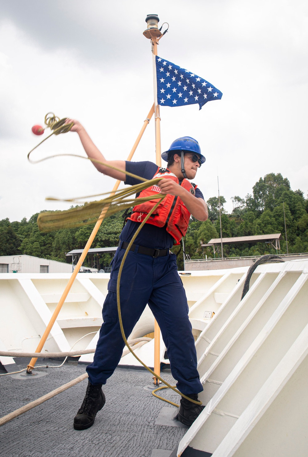 USCGC Munro Sailor Throws Mooring Line