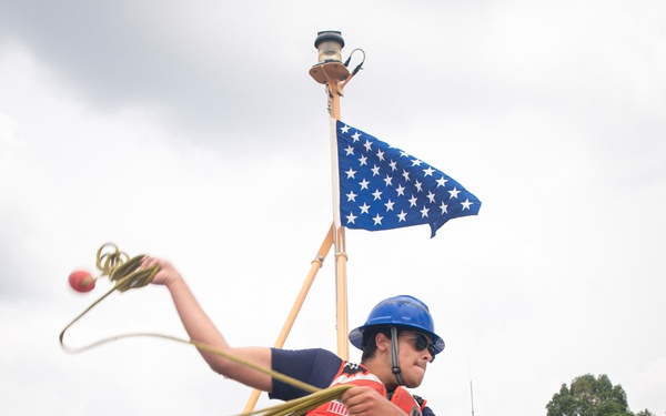 USCGC Munro Sailor Throws Mooring Line