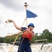 USCGC Munro Sailor Throws Mooring Line