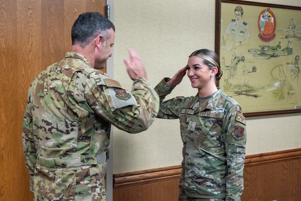 Airman Taylor Sula is promoted during drill weekend at the 182nd Airlift Wing