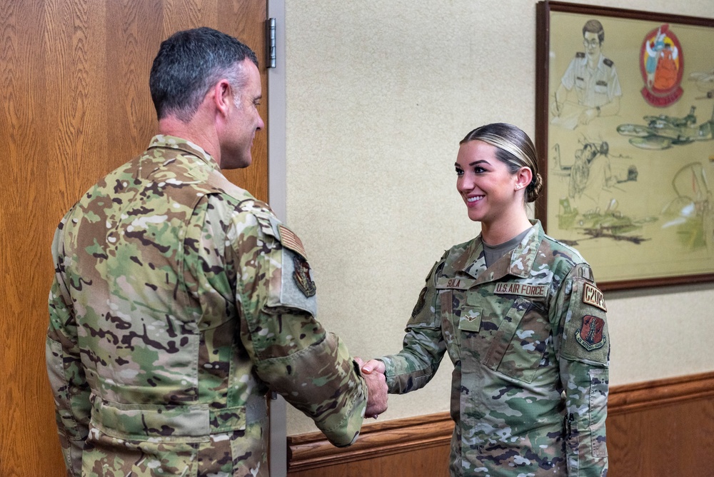 Airman Taylor Sula is promoted during drill weekend at the 182nd Airlift Wing