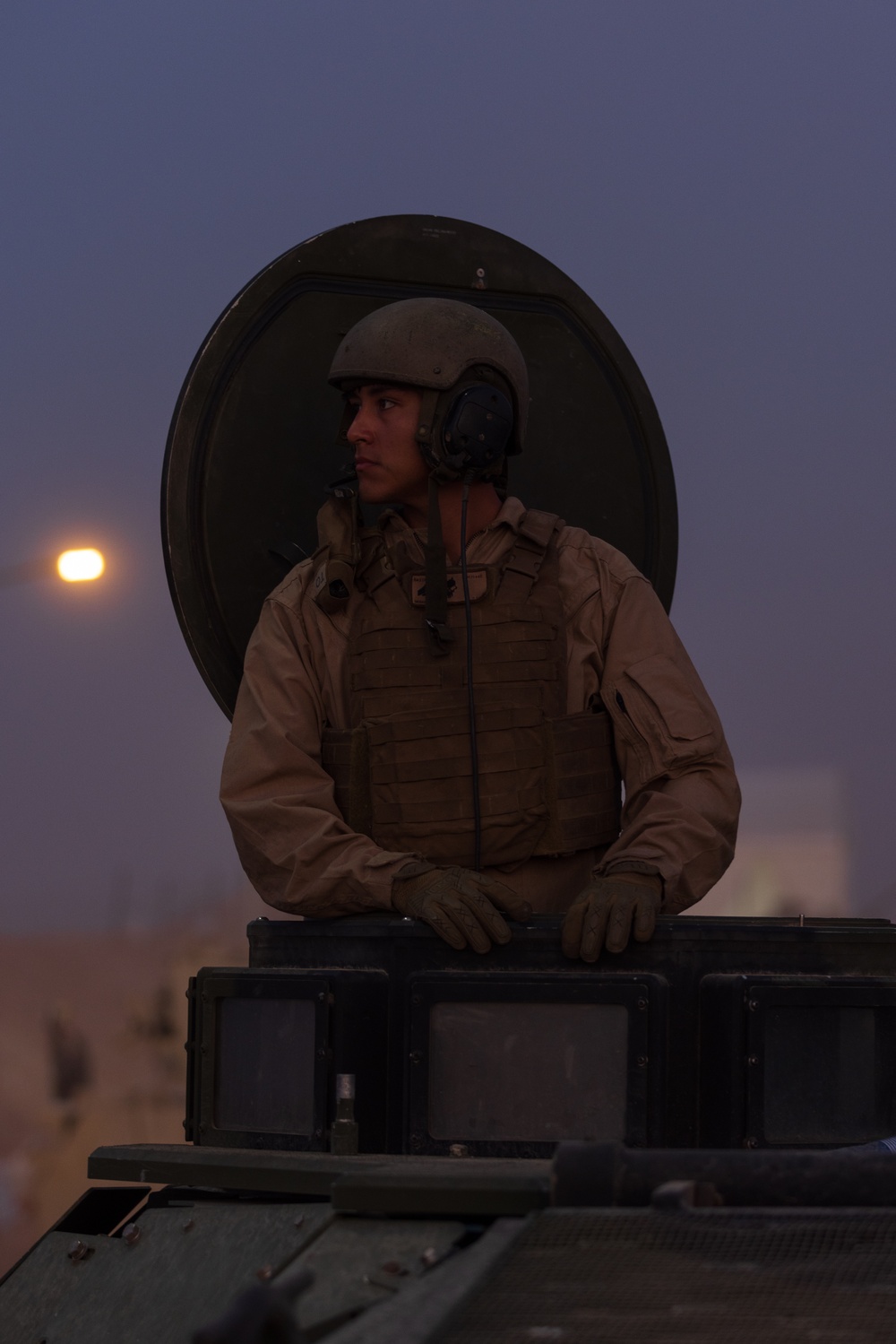 Marines with 3rd Assault Amphibian Bn. zero their weapons.