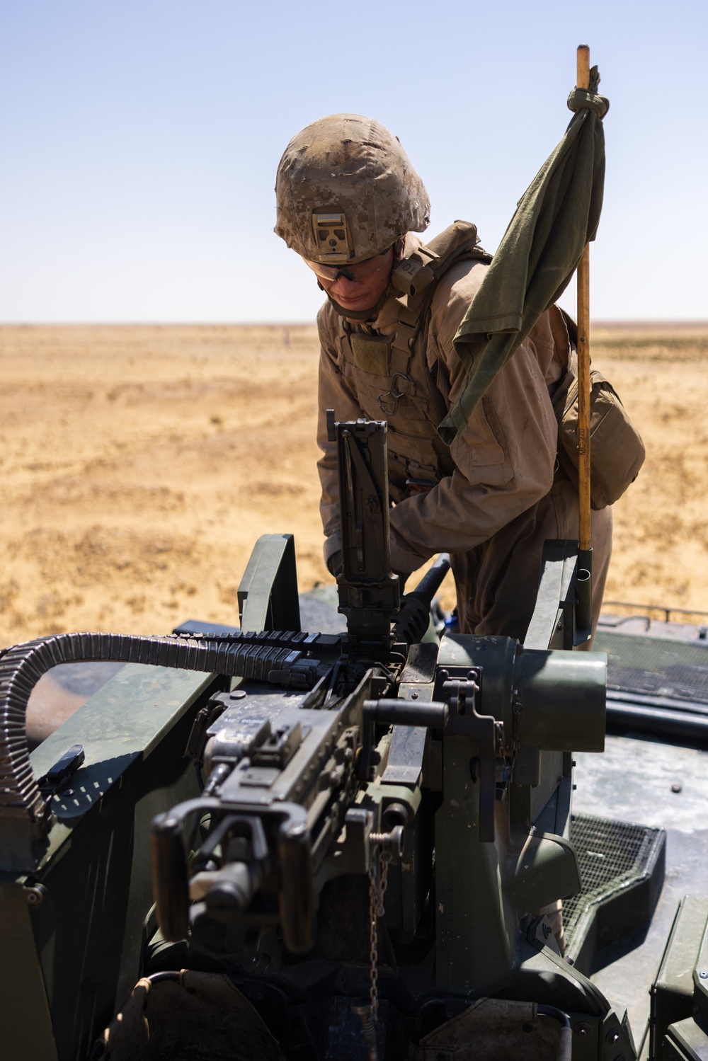 Marines with 3rd Assault Amphibian Bn. zero their weapons.