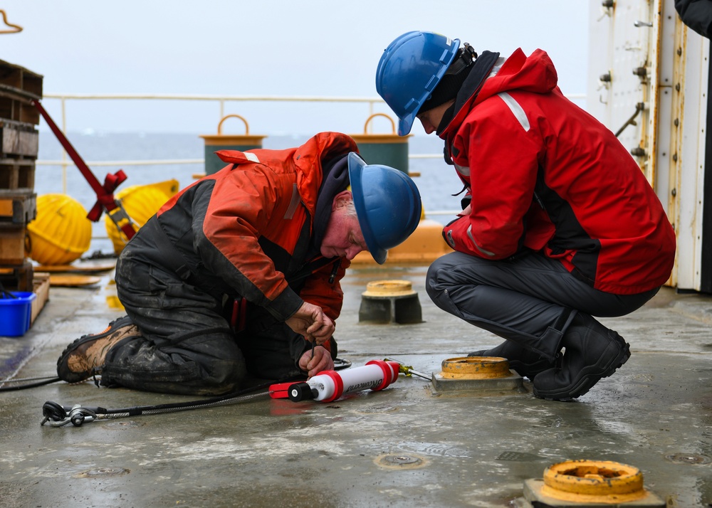 U.S. Coast Guardsmen conduct science operations