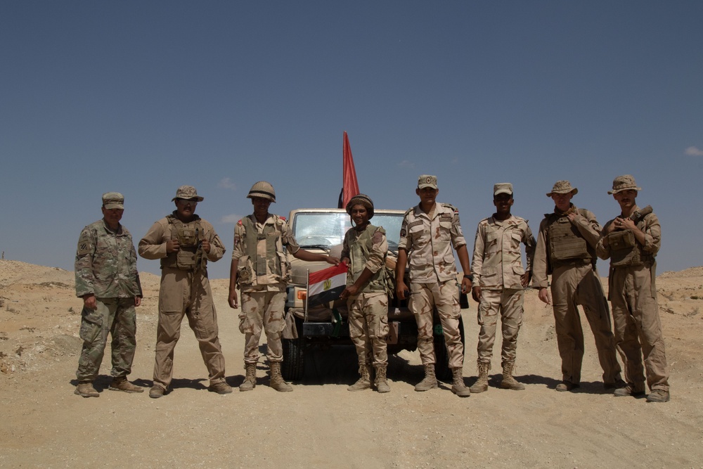 U.S. Army Soldiers and U.S. Marines pose alongside their Egyptian military service counterparts before a rehearsal in preparation for a combined live fire exercise during  Bright Star 2023