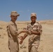 U.S. Marine shares a meal ready to eat with an Egyptian soldier before the start of a dry fire rehearsal in support of exercise Bright Star 2023