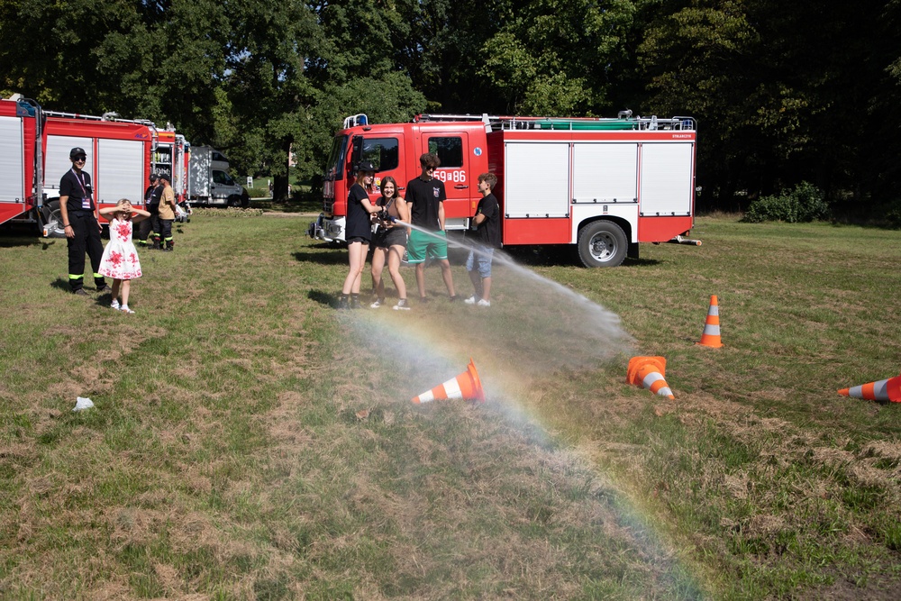 U.S. Army Soldiers participate in a community event in Poland