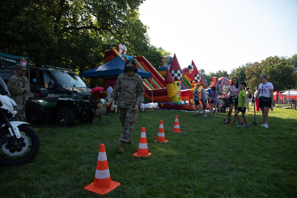 U.S. Army Soldiers participate in a community event in Poland