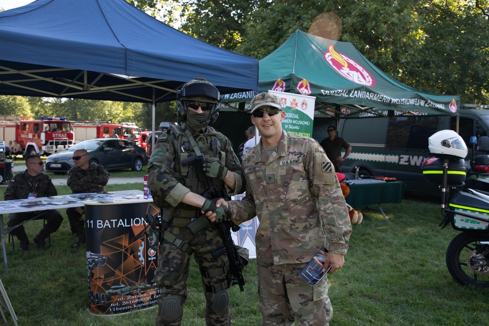 U.S. Army Soldiers participate in a community event in Poland