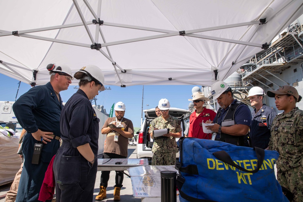 Makin Island Sailors participate in a simulated fire drill