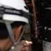 Keeping it Cool : Japanese Contractors on Marine Air Station Iwakuni repair air conditioning unit