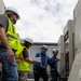 Keeping it Cool : Japanese Contractors on Marine Air Station Iwakuni repair air conditioning unit