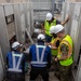 Keeping it Cool : Japanese Contractors on Marine Air Station Iwakuni repair air conditioning unit