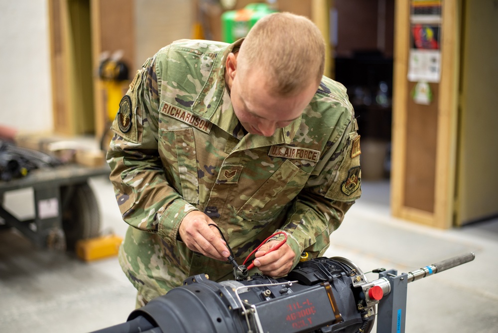 378th EAMXS performs maintenance on F-16 20mm gun system