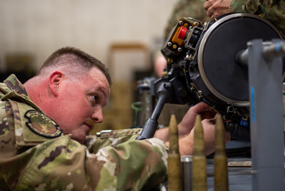 378th EAMXS performs maintenance on F-16 20mm gun system