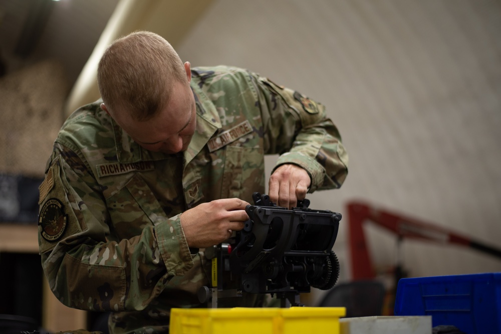 378th EAMXS performs maintenance on F-16 20mm gun system