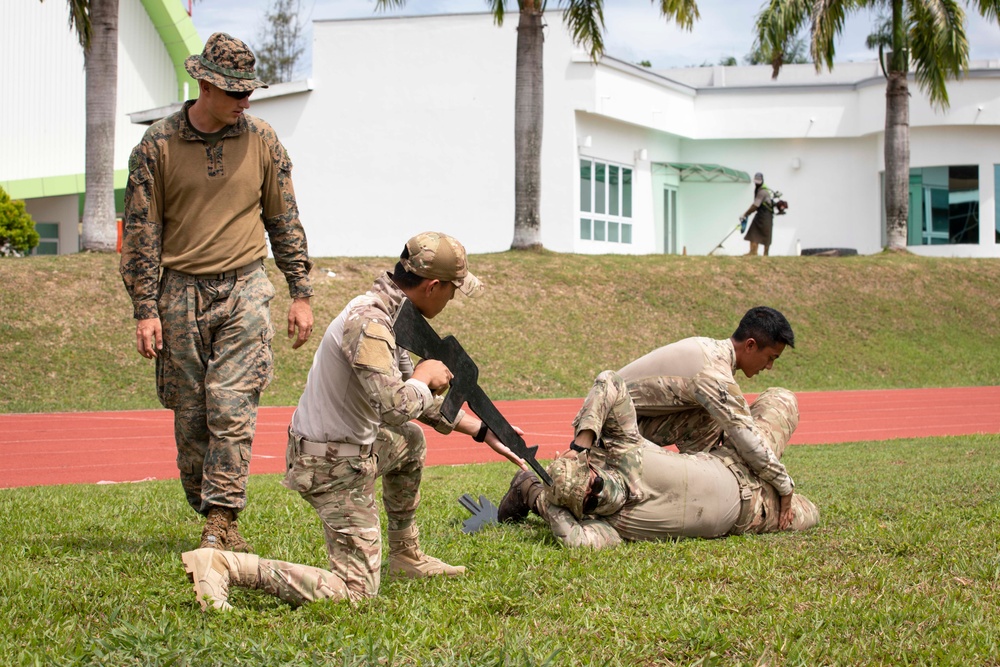 Service Members Conduct Force Protection Subject Matter Expert Exchange During CARAT Brunei 2023