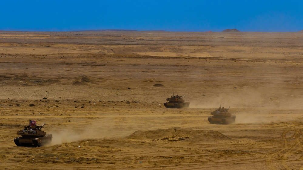 U.S. Soldiers assigned to Task Force Reaper maneuver M1A2 Abrams tanks during exercise Bright Star 2023