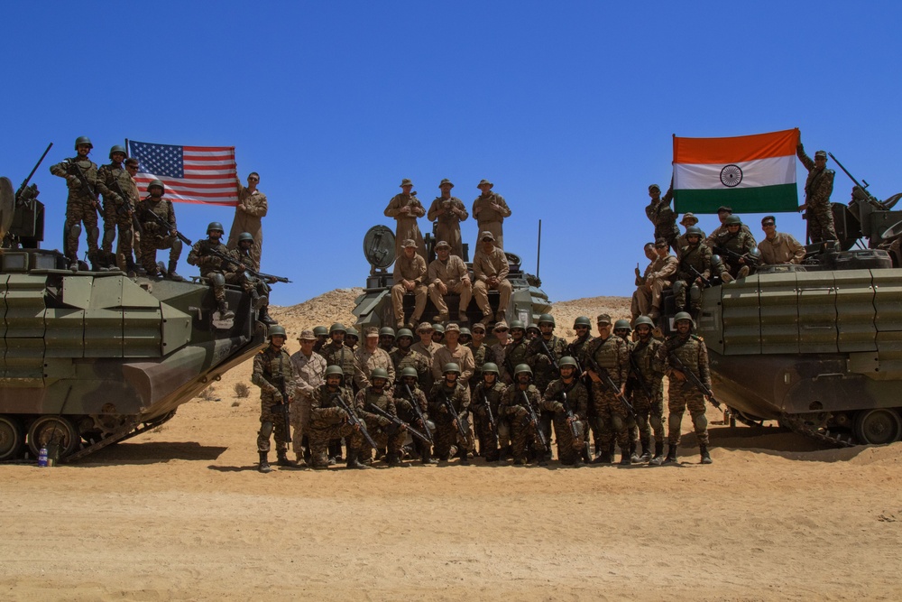 U.S. Marines celebrate the end of a live fire exercise with Indian Army soldiers