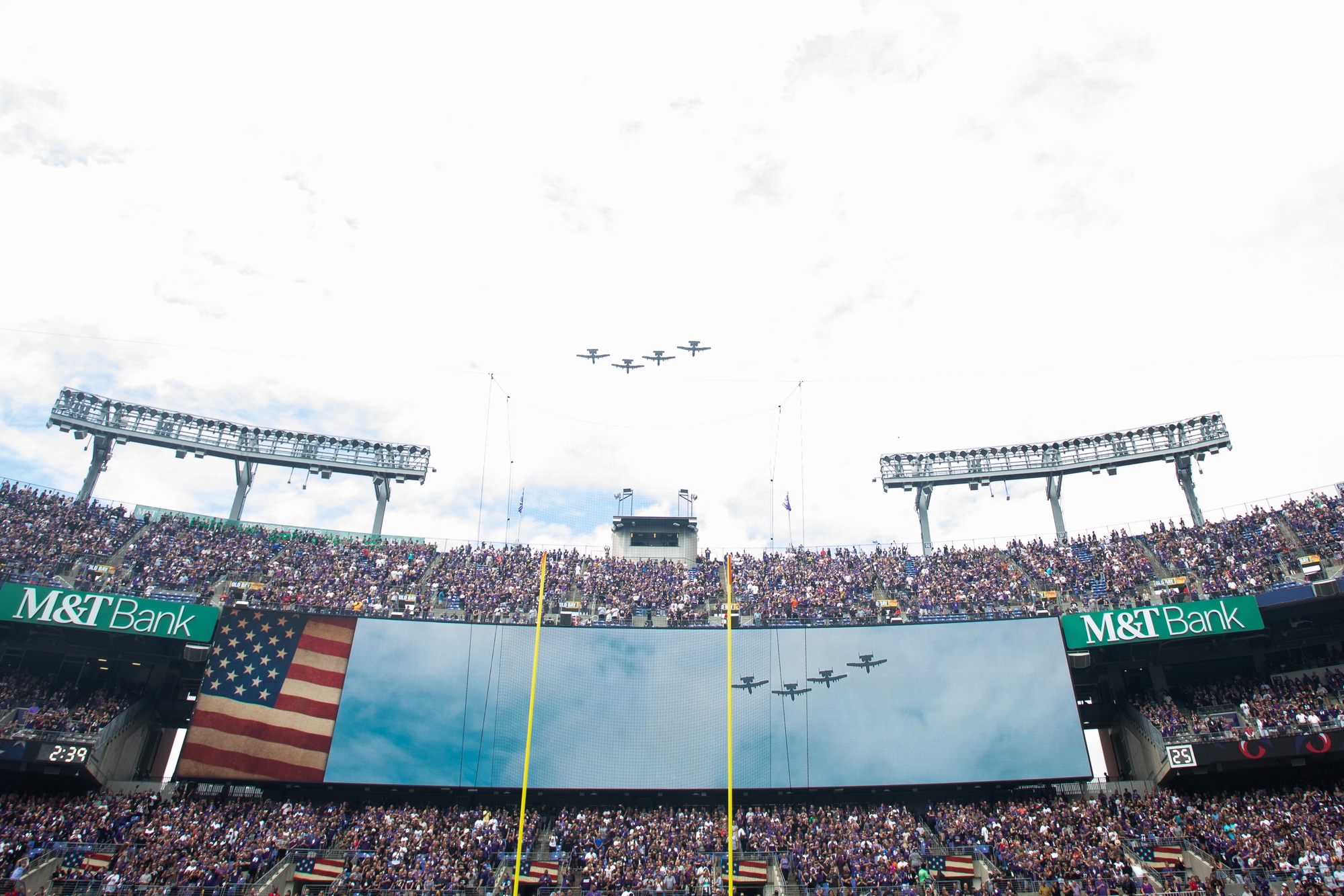 Maryland National Guard soldiers and airmen participate in the pre-game  ceremony for the Baltimore Ravens against the Miami Dolphins game at M&T  Bank Stadium in Baltimore, Md., Sept. 18, 2022. The pre-game