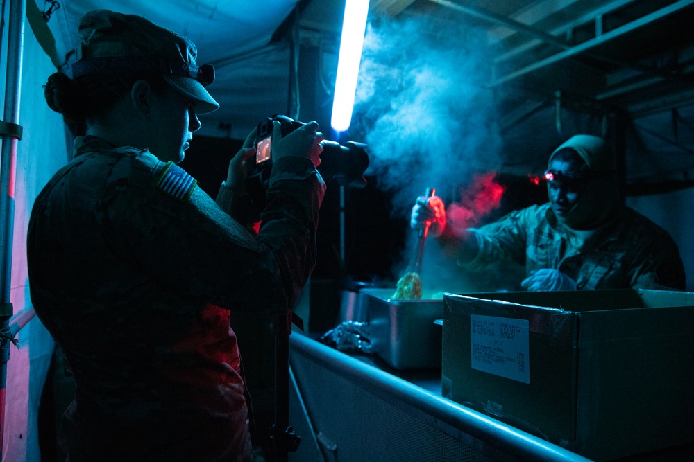 Public affairs documents culinary specialists keeping troops fueled during Saber Junction 23