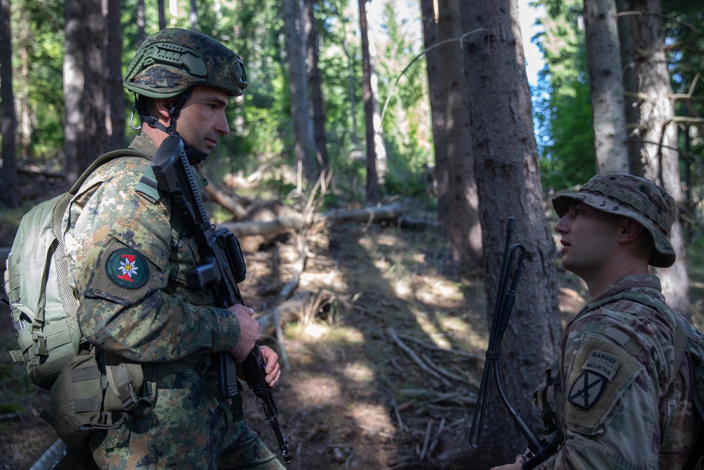 Soldiers from 10th Mountain Division and Bulgarian Land Forces 101st Alpine Regiment participate in the Rhodope 23 attack lane on Sep. 12, 2023, near Smolyan, Bulgaria