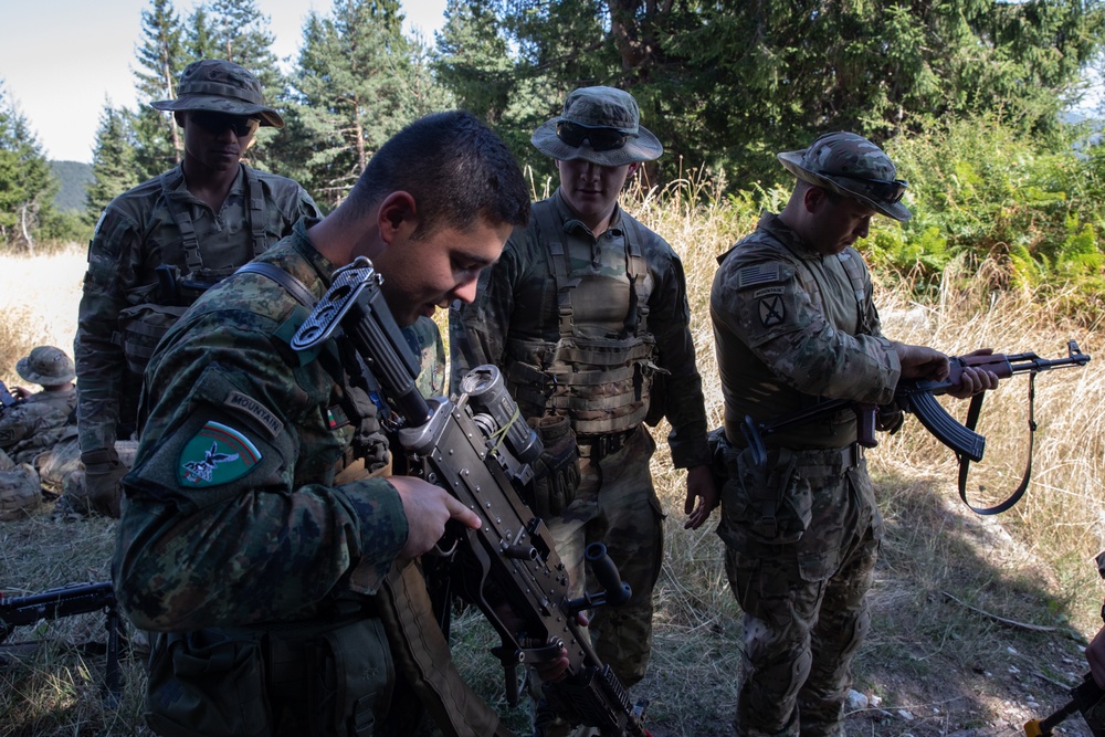 Soldiers from 10th Mountain Division and Bulgarian Land Forces 101st Alpine Regiment participate in the Rhodope 23 attack lane on Sep. 12, 2023, near Smolyan, Bulgaria