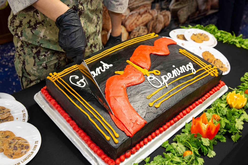 USS Abraham Lincoln serves lunch for the opening of the galley