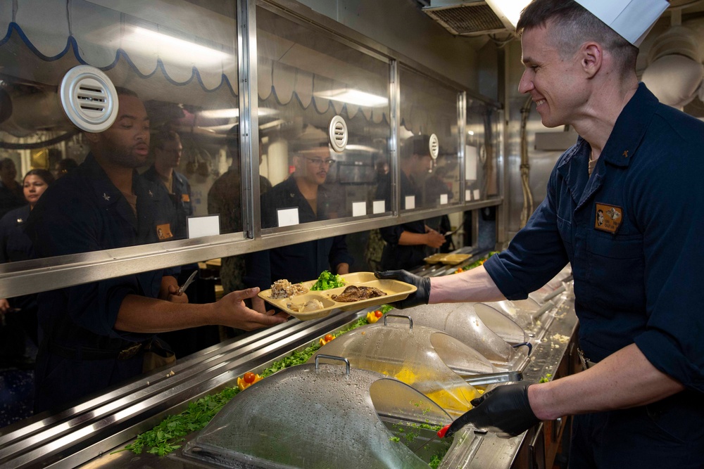 USS Abraham Lincoln serves lunch for the opening of the galley