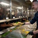 USS Abraham Lincoln serves lunch for the opening of the galley