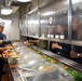 USS Abraham Lincoln serves lunch for the opening of the galley
