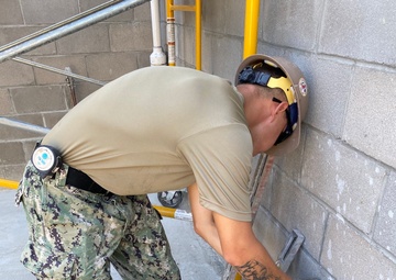 NMCB 133 Builds Shower Facility for SBT-22