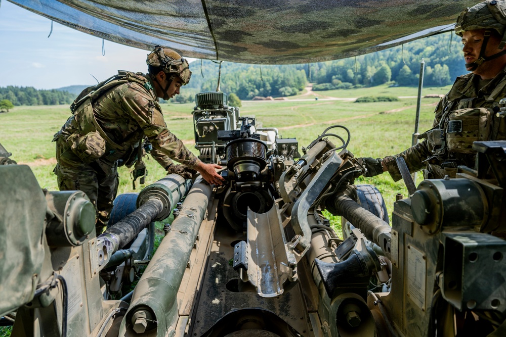 Field artillery crews set up positions at Saber Junction 23