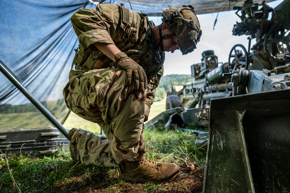 Field artillery crews set up positions at Saber Junction 23