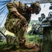 Field artillery crews set up positions at Saber Junction 23