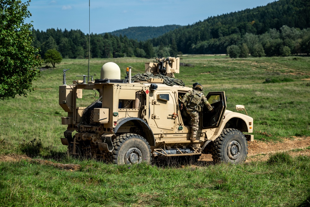 Field artillery crews set up positions at Saber Junction 23