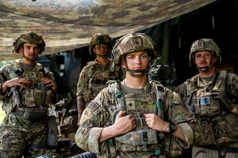 Field artillery crews set up positions at Saber Junction 23