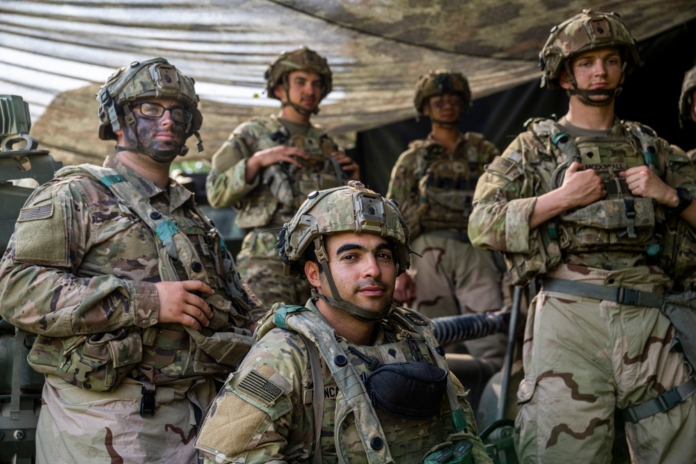 Field artillery crews set up positions at Saber Junction 23