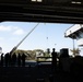 USS Abraham Lincoln performs an ammunition offload