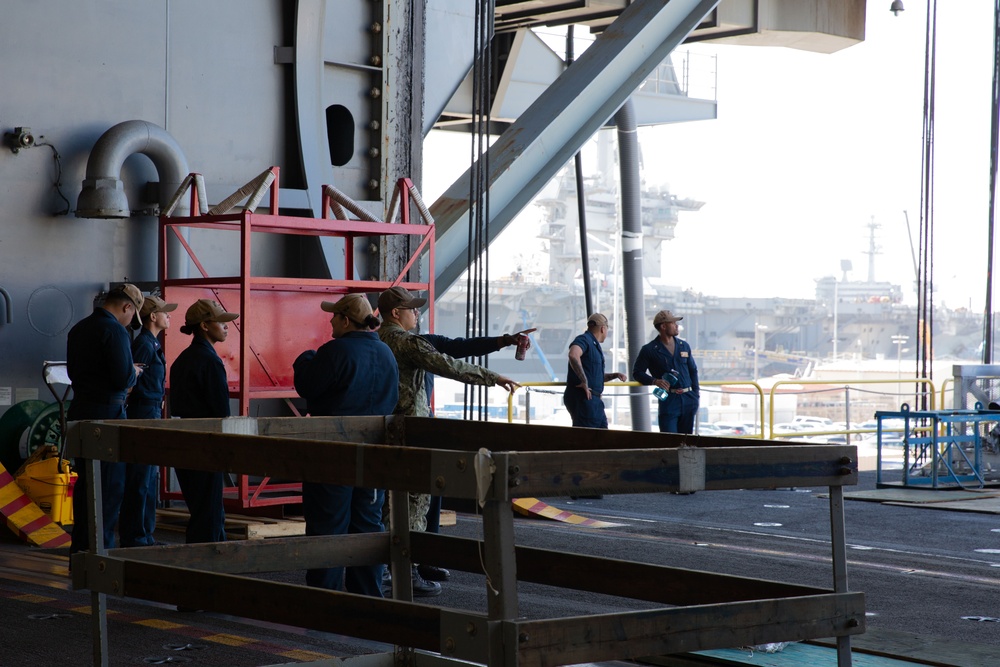 USS Abraham Lincoln performs an ammunition offload