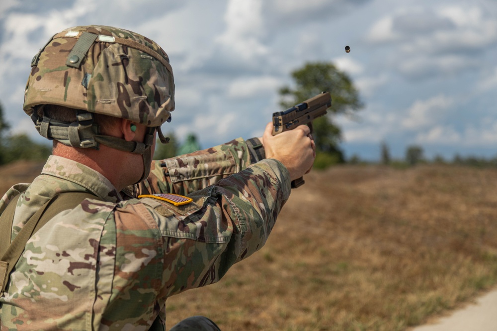 Sgt. Connor Housman fires an M17 pistol