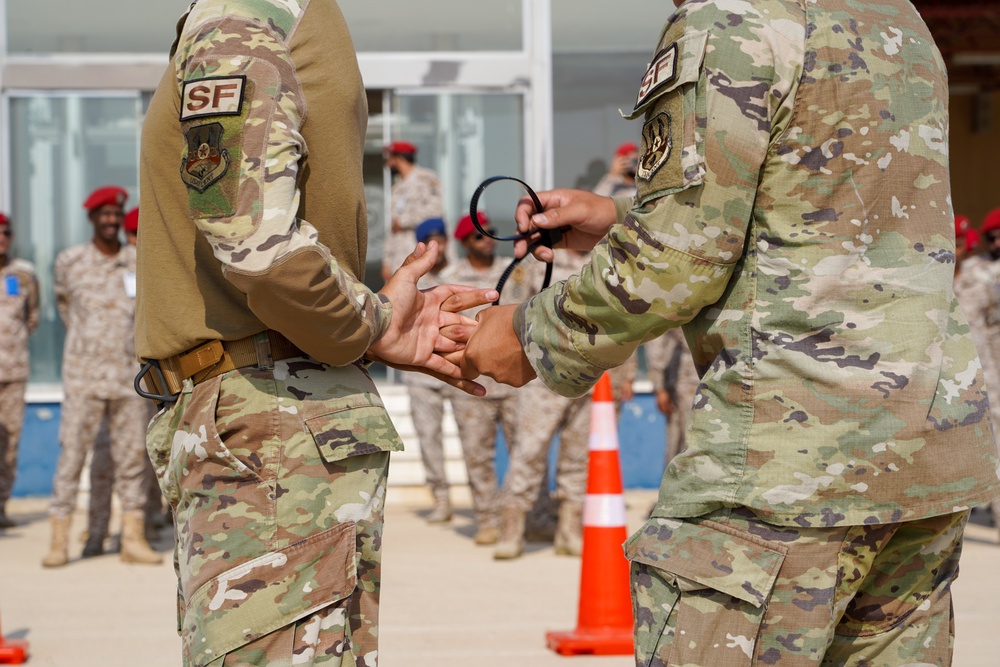 378th ESFS demonstrates police tactics to RSAF