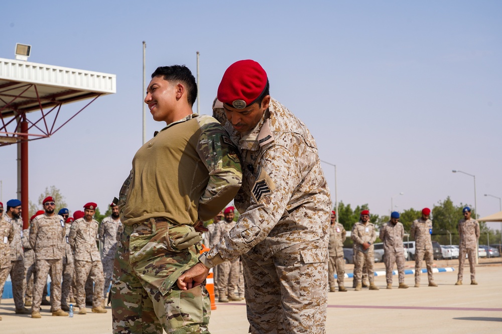 378th ESFS demonstrates police tactics to RSAF