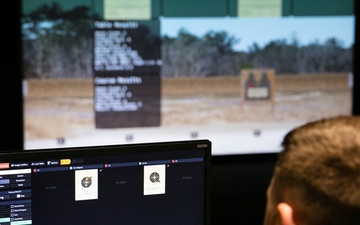 Soldier views targets at the Engagement Skills Trainer facility