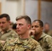 A Pilot Listens Intently During an After Action Review