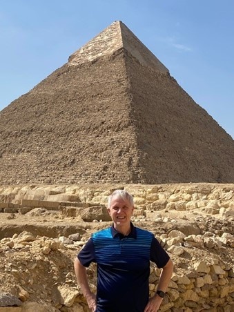 Brian Struntz visiting the pyramids in Cairo.
