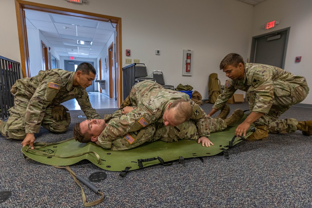 The 2023 Army Reserve Best Squad winners practice tactical combat casualty care