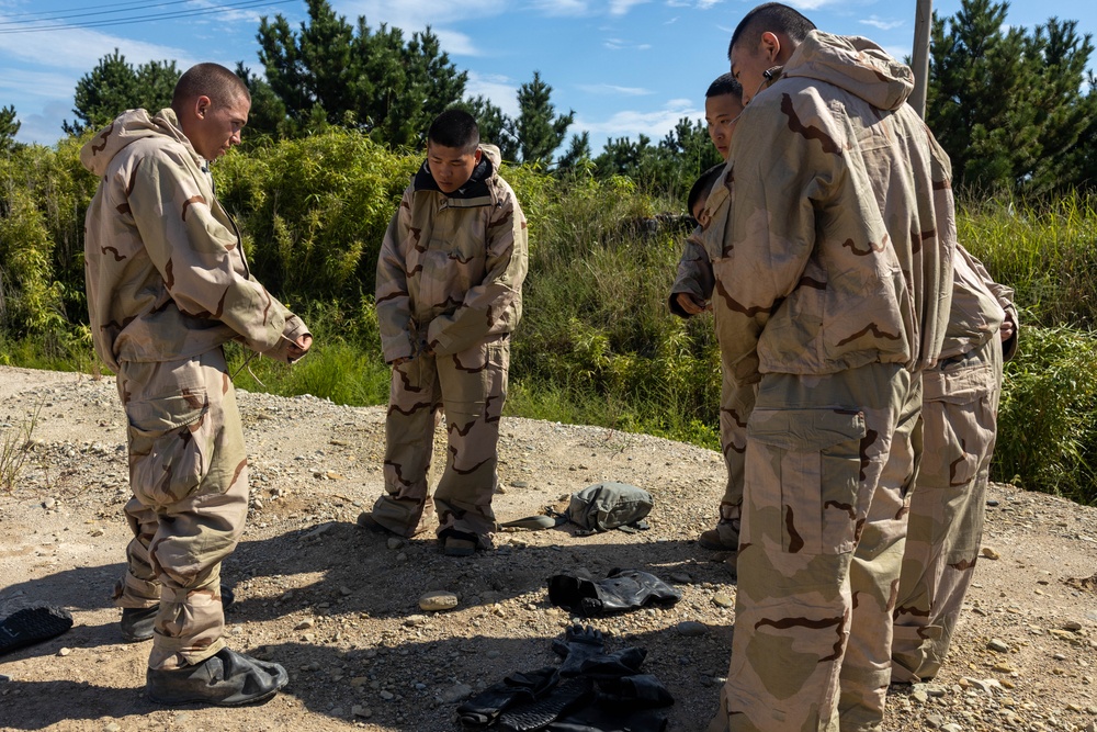 KMEP 23.3 | Marine CBRN Specialists conduct simulated decontamination line with ROK Marines