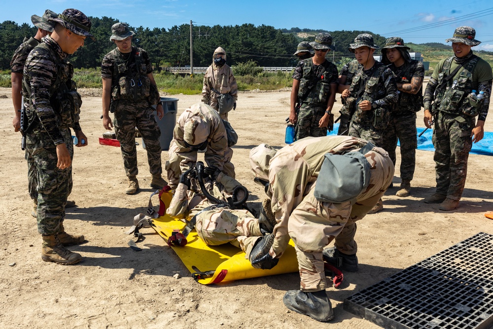 KMEP 23.3 | Marine CBRN Specialists conduct simulated decontamination line with ROK Marines